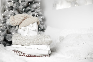 Cozy winter clothes and gift box by, a Holiday Photo by Anna Efetova