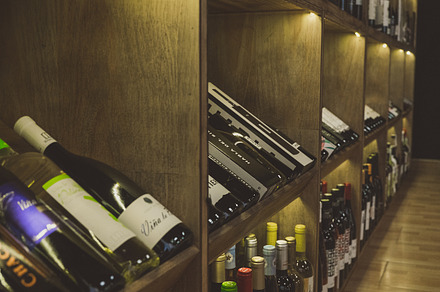 Wine cellar featuring grocery, gourment, and market