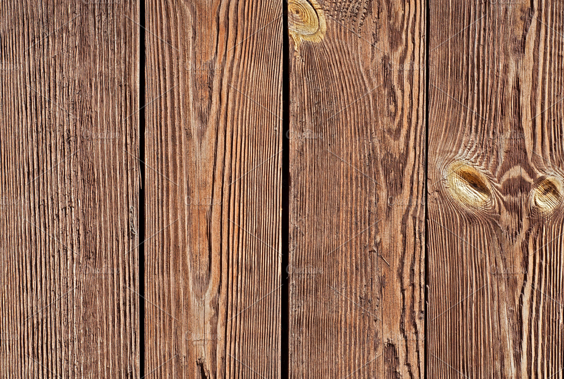 Knotted wooden planks featuring wooden, wood, and background