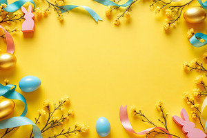 Yellow Easter background with eggs a, a Holiday Photo by Volff