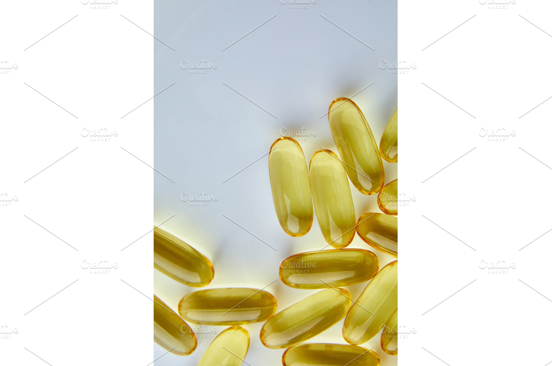 Flat lay fish oil capsules Omega 3, a Health & Medical Photo by IlliaBondarPhotography