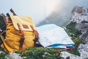 Yellow backpack and map