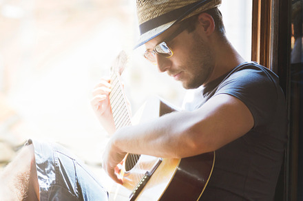 Young hipster man plays the guitar stock photo containing hipster and musician, a Person Photo by hitdelight