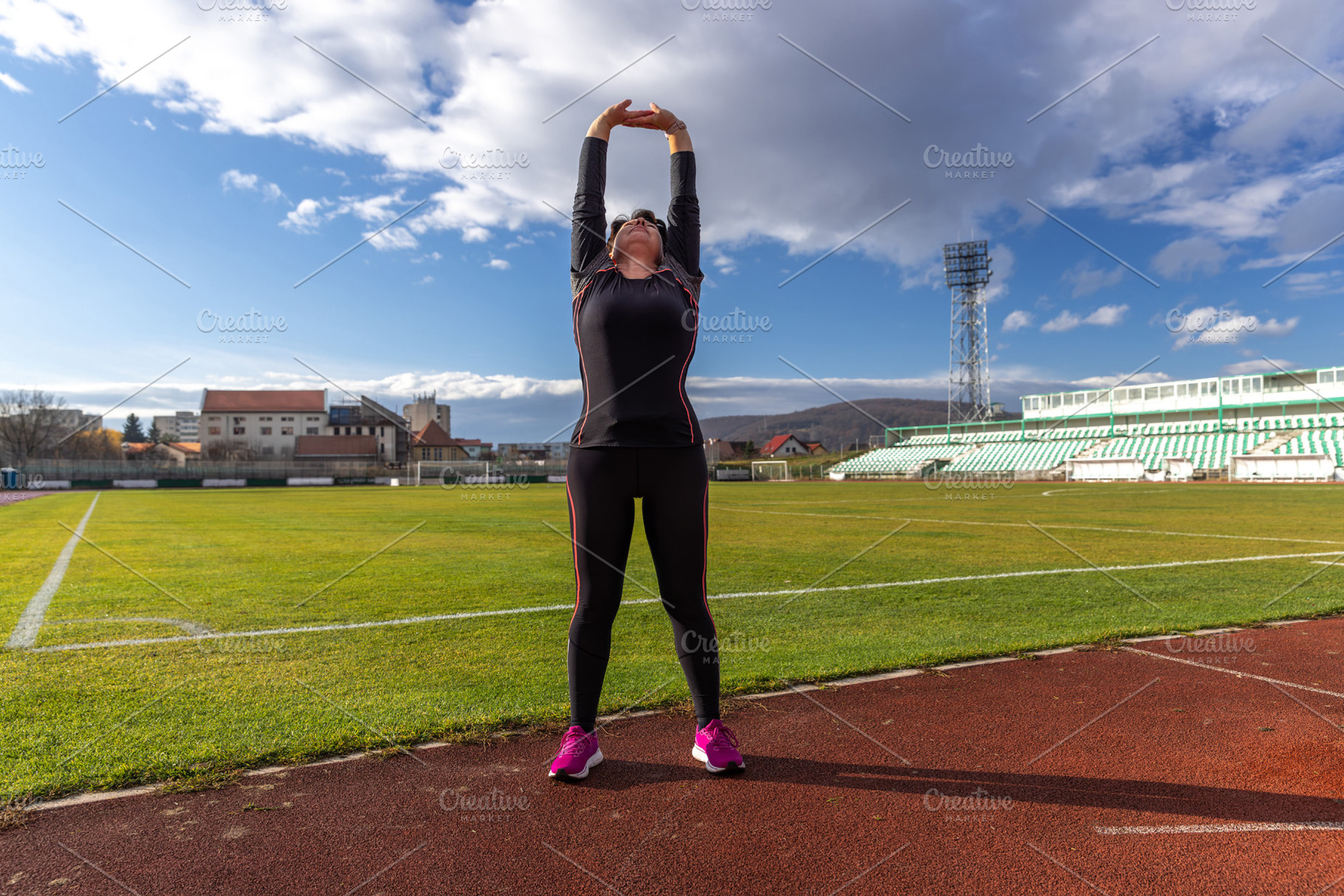 Woman stretching arms, a Photo by Grafvision photography