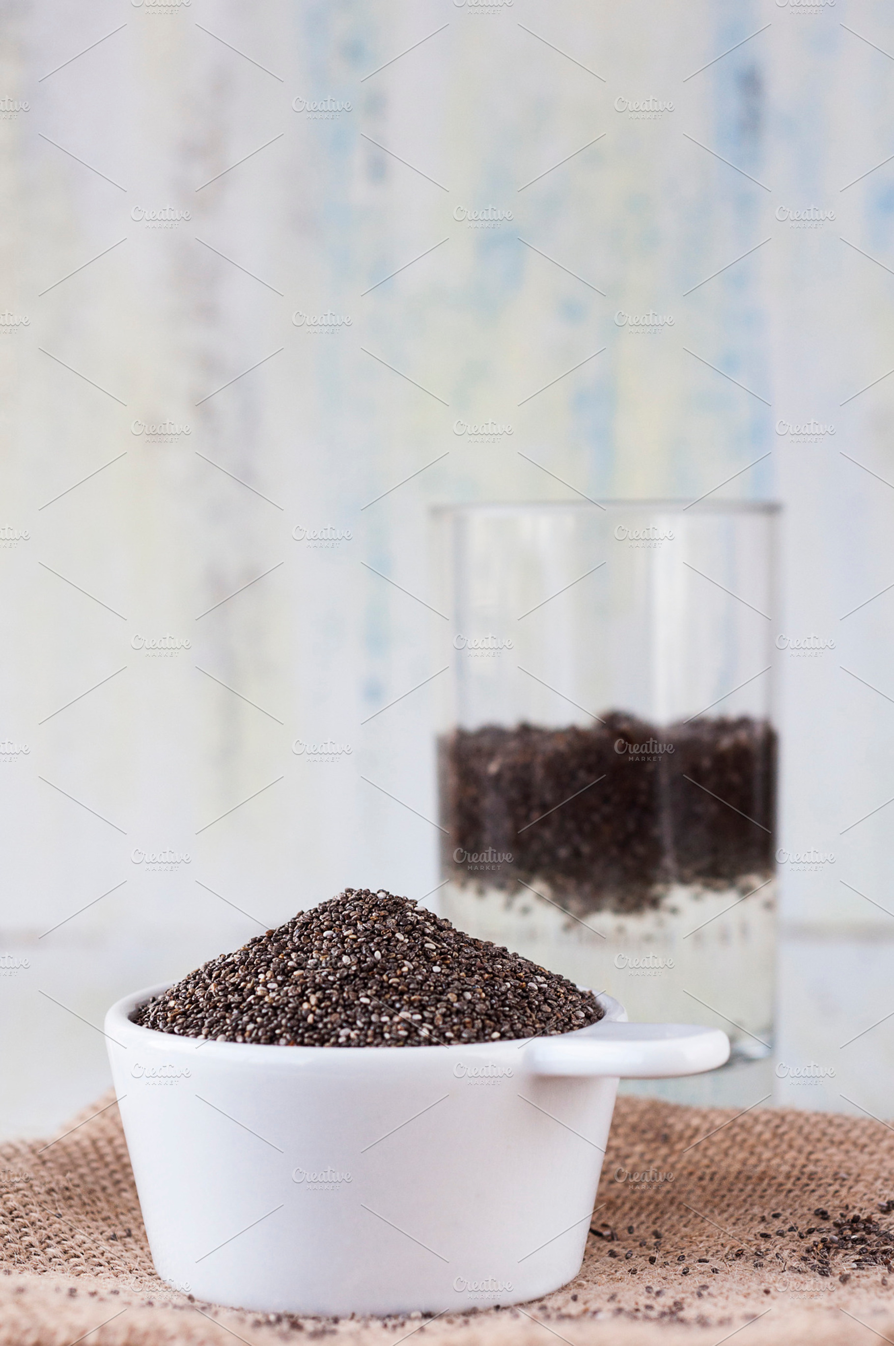 Container and glass of chia, a Health & Medical Photo by REBECAZUM