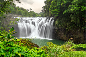 Shifen Waterfall surrounded by lush, a Nature Photo by Leonid Andronov