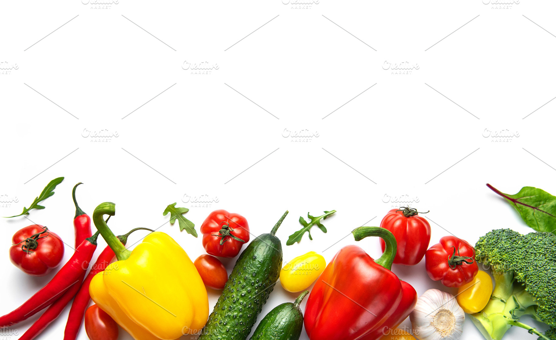 Fresh organic vegetables forming healthy food border, a Food & Drink Photo by Olena Rudo