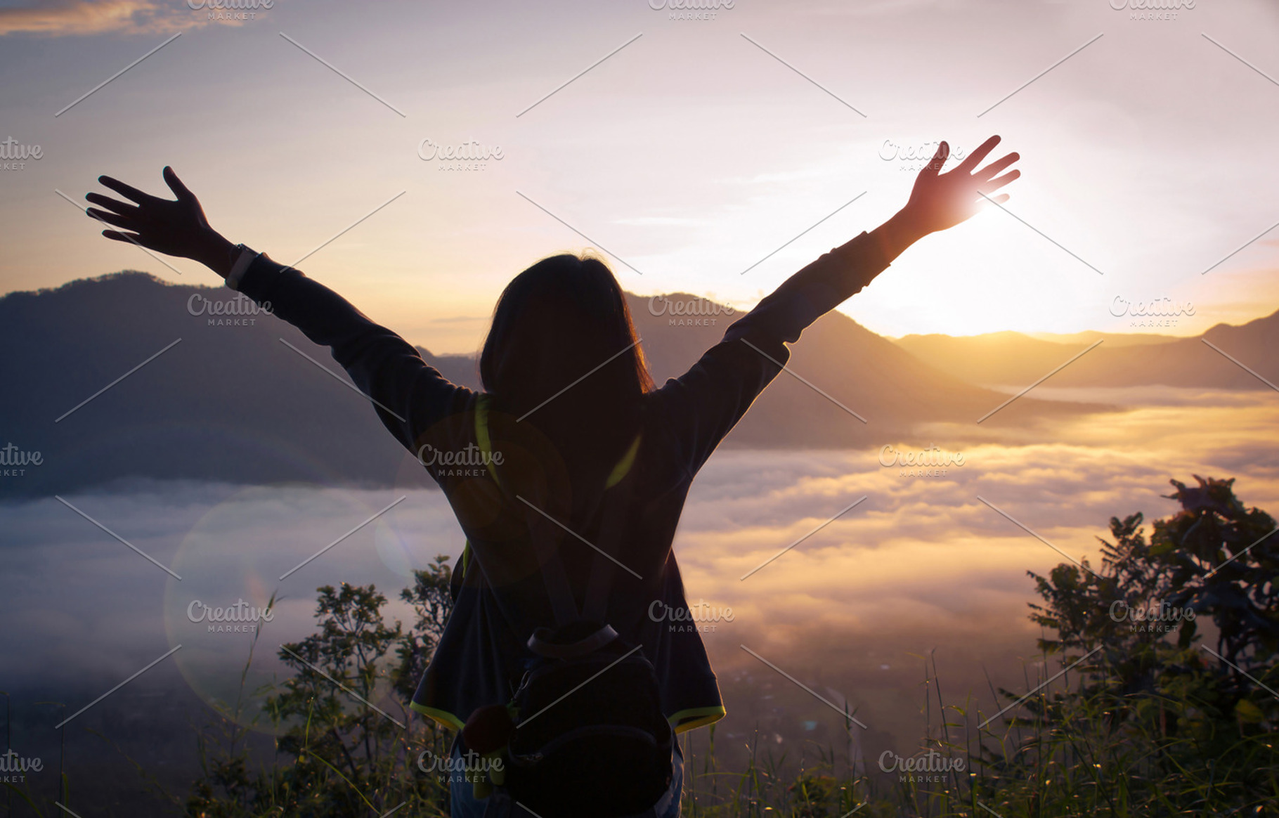 Happy woman in the mountains stock photo containing joy and outdoor, a Person Photo by Nednapa