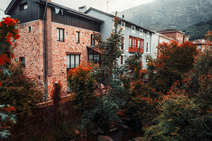 Cabrales village houses in autumn, an Architecture Photo by SkyNext
