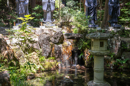 Bronze monk statues at Mitaki-Dera temple in Hiroshima, Japan, a Nature Photo by GoodGoods