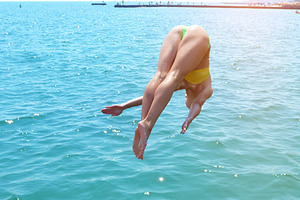 the girl dives beautifully under the