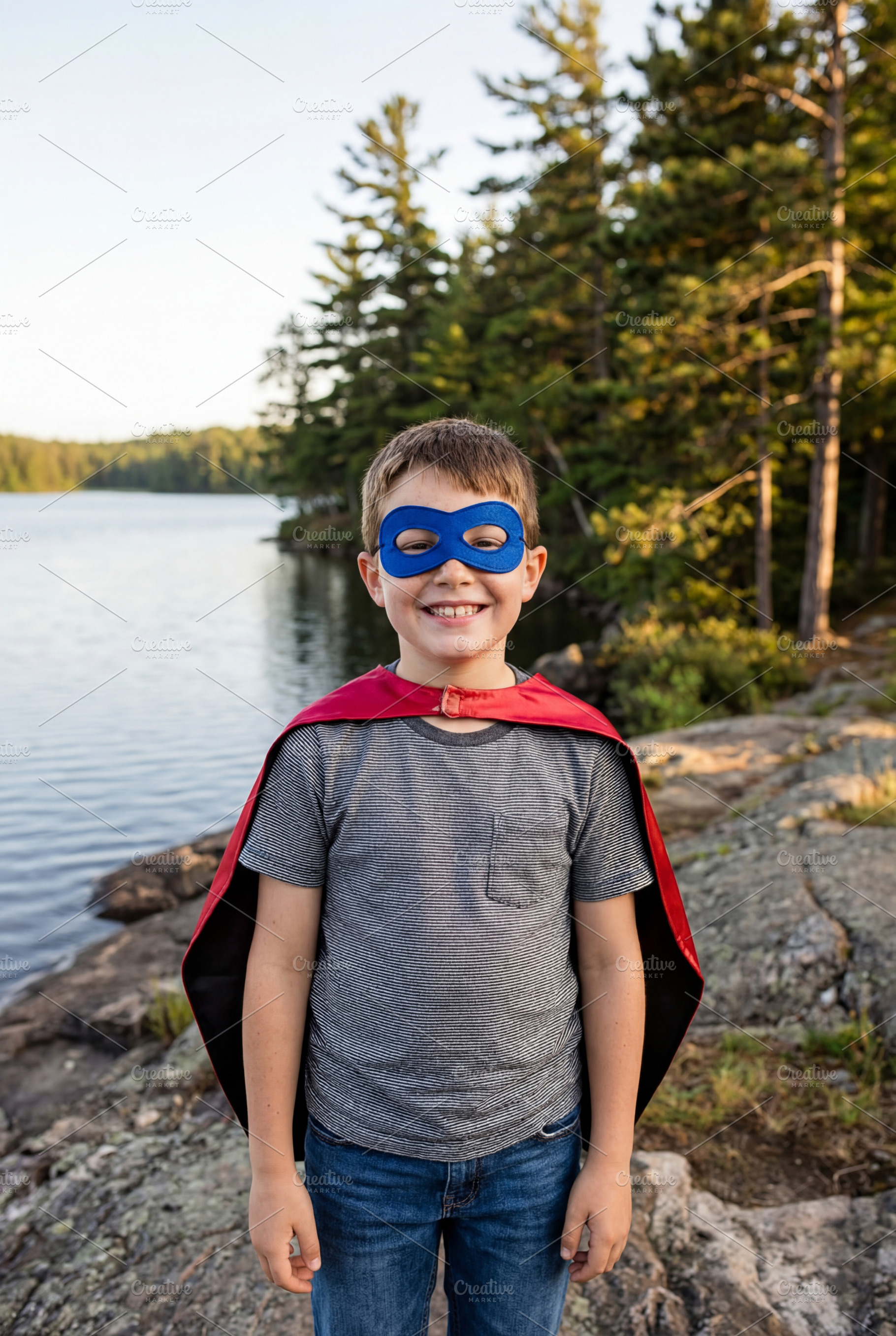 Young Boy in Superhero Cape and Mask, a Person Photo by Virgo Studio
