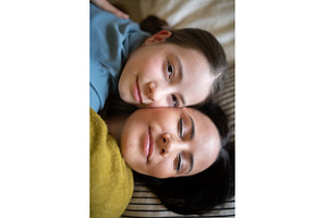 Top view of girl and mom talking in, a Person Photo by HalfPoint