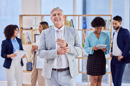 Business man, leadership and happy in portrait with senior executive, boss and smile in workplace. Team leader, management and professional mature male, CEO and development with career success, a Photo by Peopleimages.com