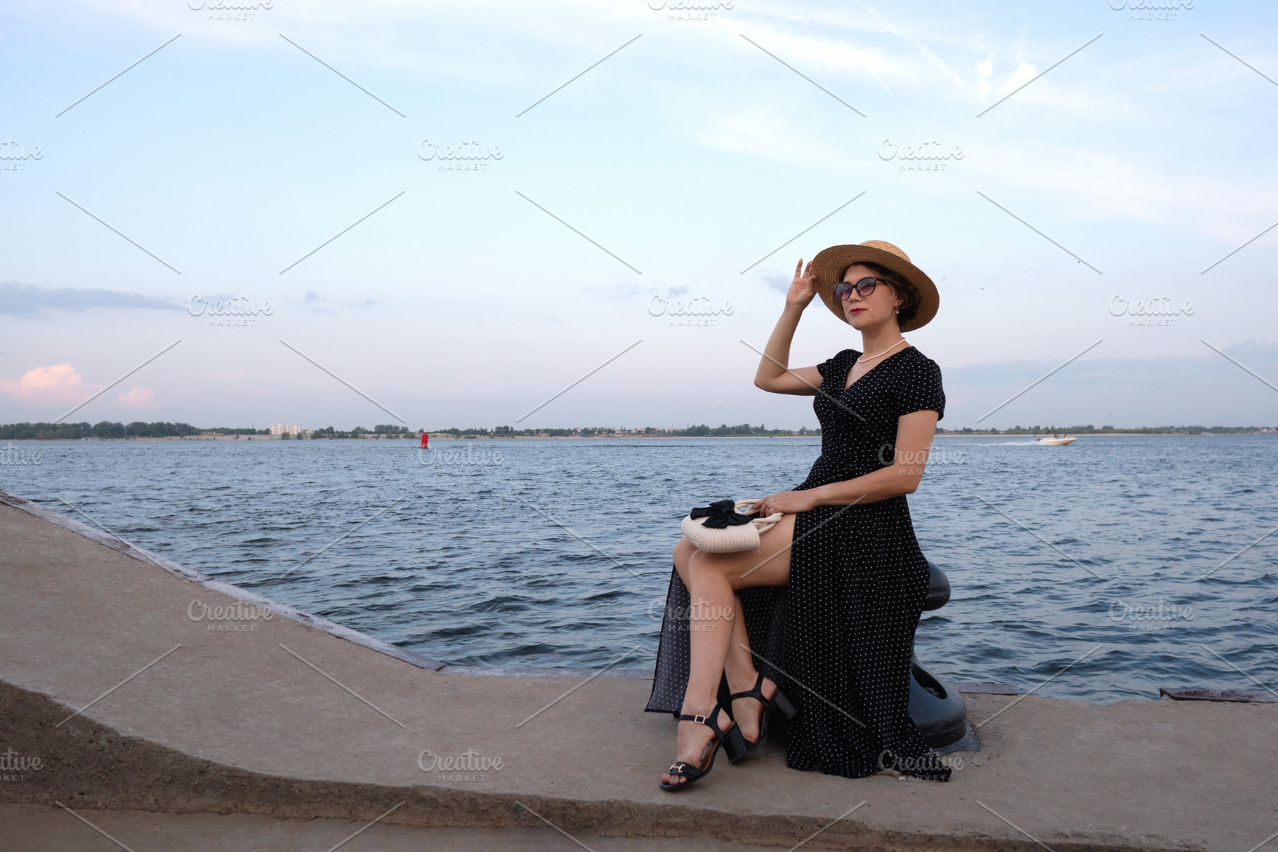 Woman in polka-dot dress poses, a Person Photo by Elena Vagengeim