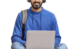 Student sitting with notebooks on legs isolated photo, a Person Photo by DanFLCreativo