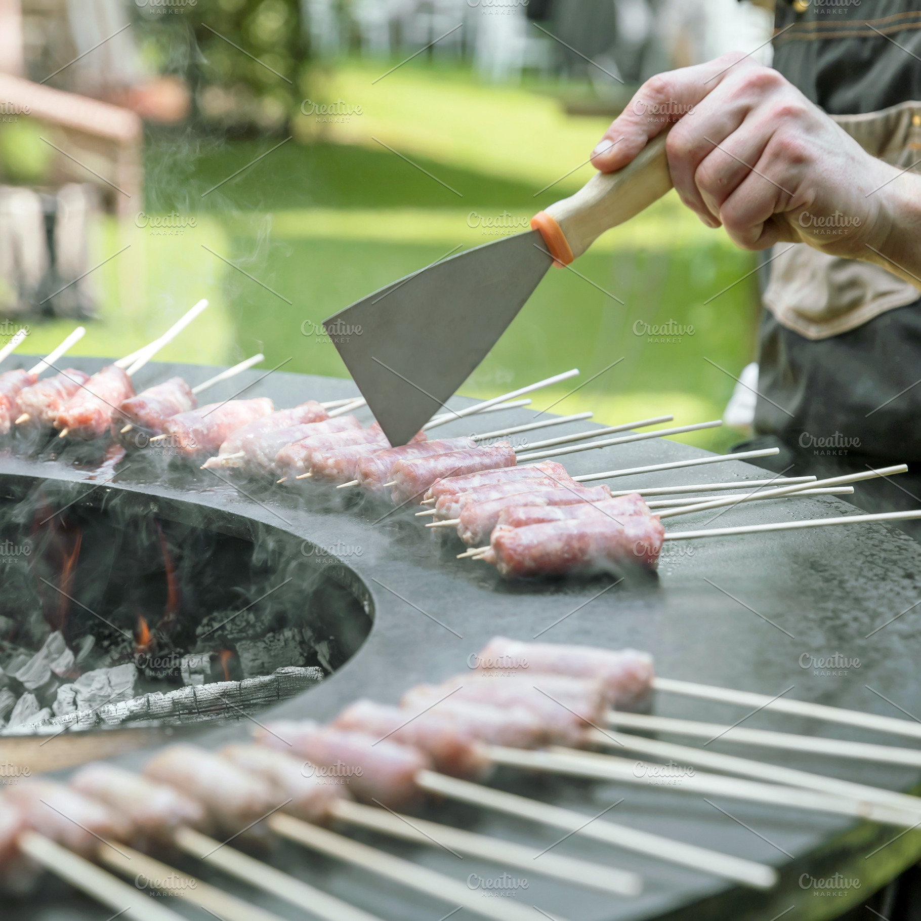 Sausage cooking, a Food & Drink Photo by KYNA STUDIO