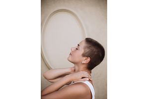 Woman with shaved head finding peace, a Beauty & Fashion Photo by Anna Efetova
