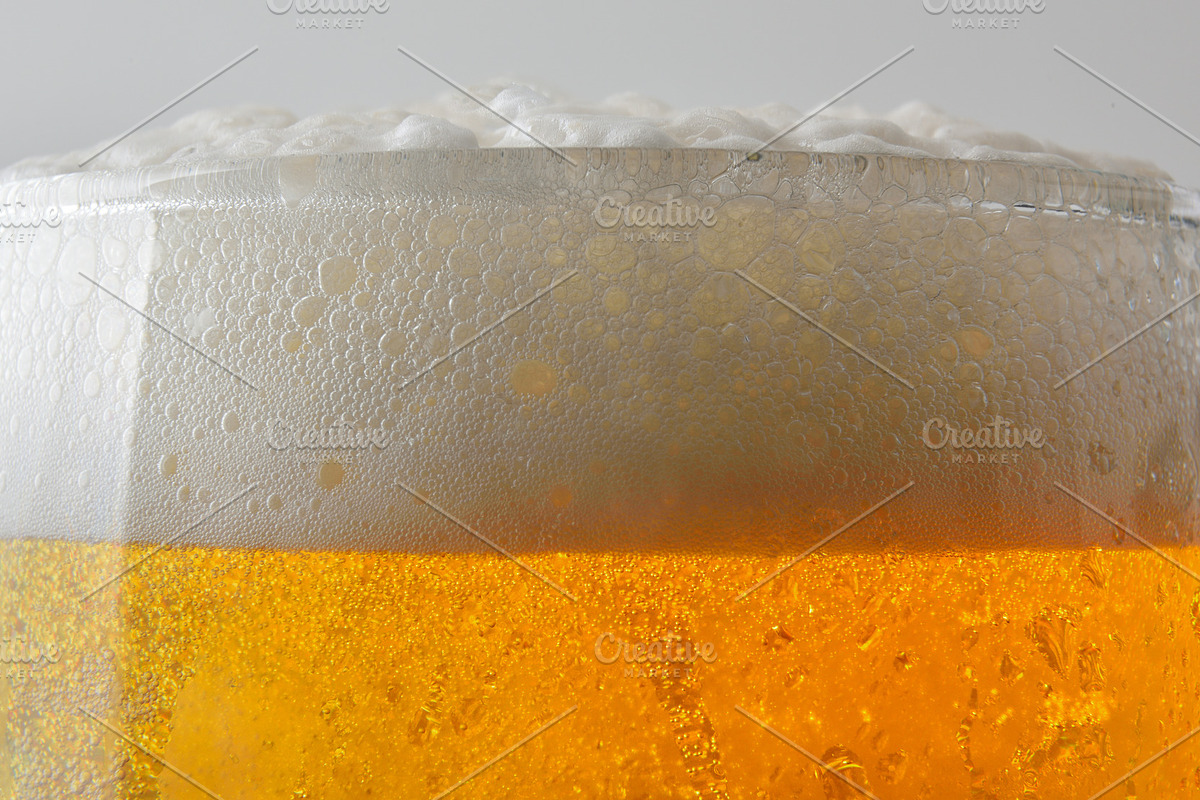 Mouth of a glass of beer with foam isolated background, a Food & Drink Photo by Davizro's Market (Photo 2 of 2)