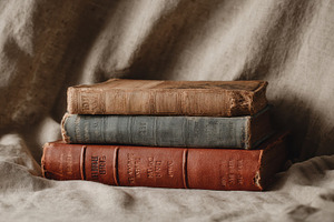 Small stack of antique books, a School & Education Photo by Virgo Studio