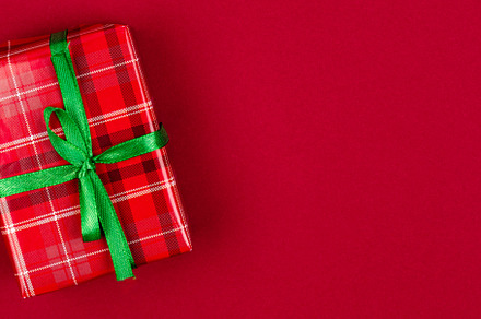Christmas composition. Red gift boxes with green ribbon at red b, a Holiday Photo by vimart