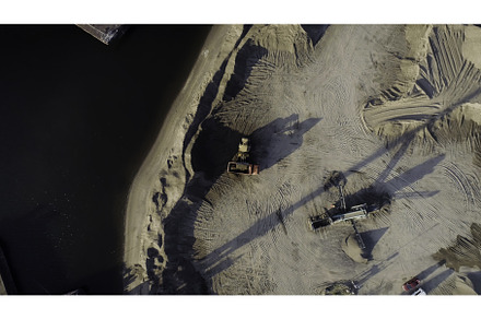 Aerial top view of trucks and, an Industrial Photo by Media Whale Stock