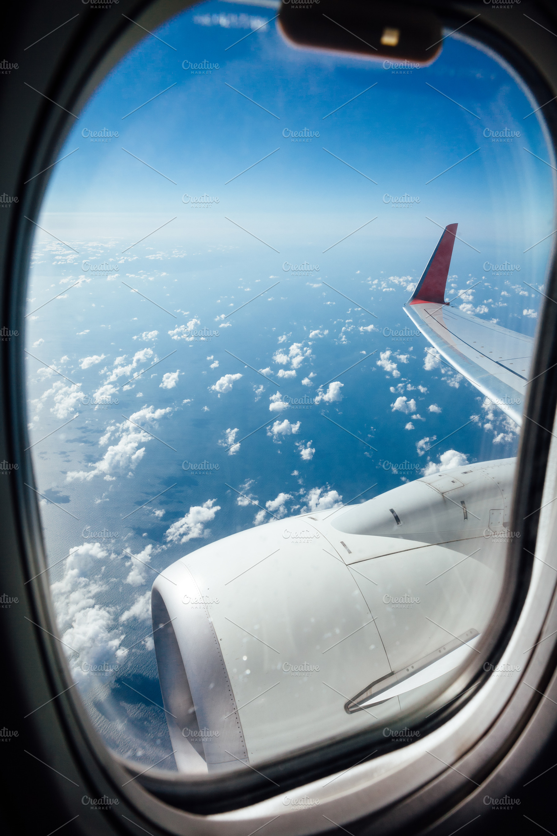 Window view from inside the aircraft during the flight, a ...