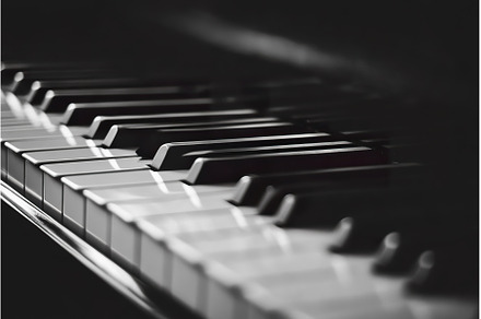 Close up of piano keys highlighting, an Arts & Entertainment Photo by Lermont51