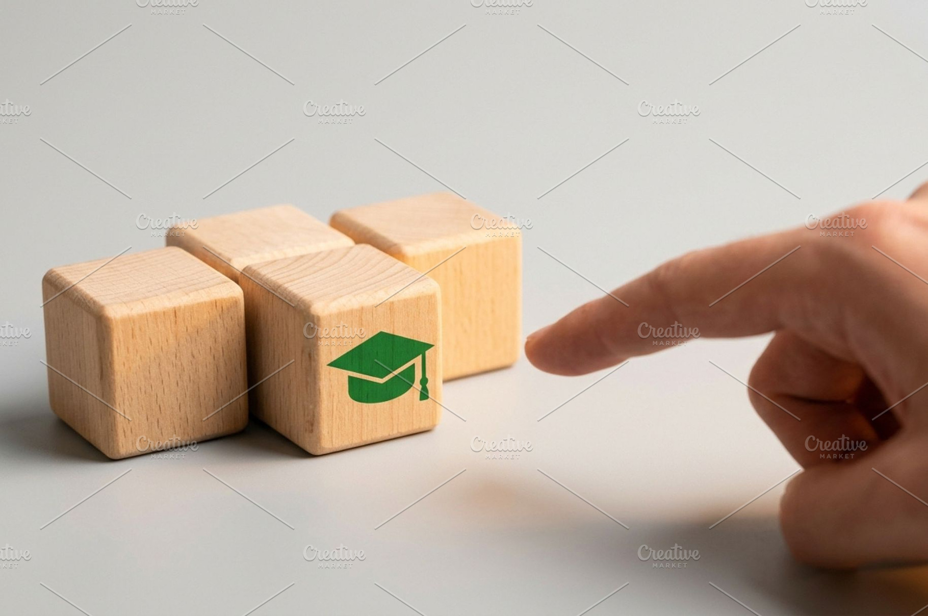 Wooden Block with Graduation Cap, a School & Education Photo by thepslr