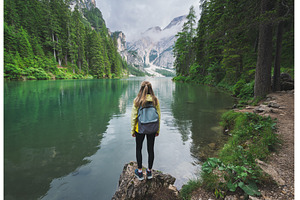 Young woman with backpack on the, a Person Photo by den-belitsky