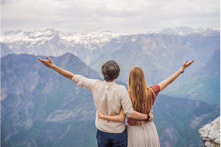 Man and woman happy couple tourists, a Nature Photo by Elizaveta Galitskaya