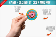 Hand Holding Sticker Mockup PSD, a Merchandise Mockup by Bruno's Shop (Thumbnail 1 of 4)