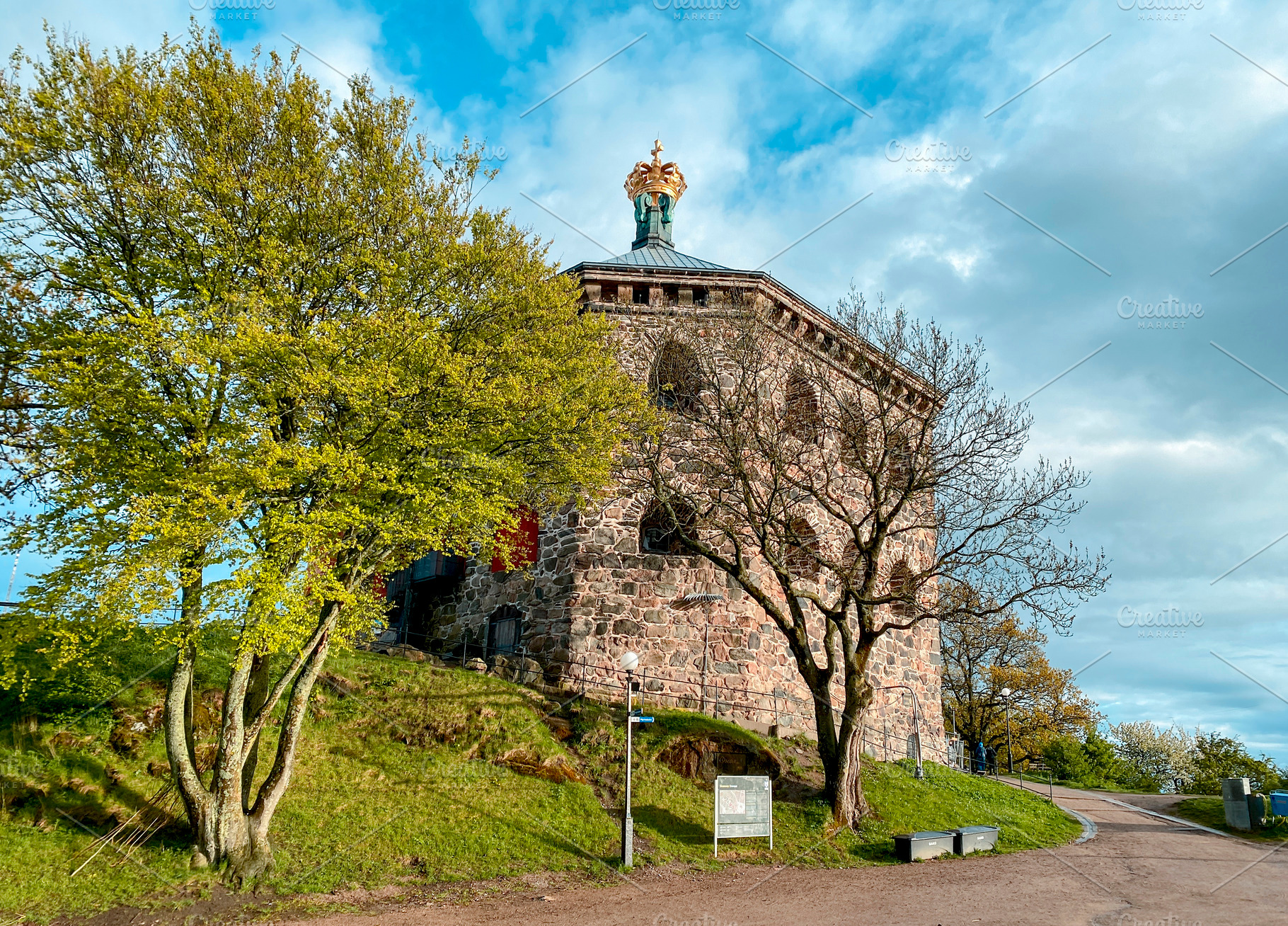 Skansen Kronan framed by trees in Gothenburg, a Photo by Nito