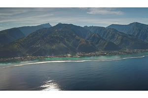 Aerial view of a coastal town, a Nature Photo by Goinyk