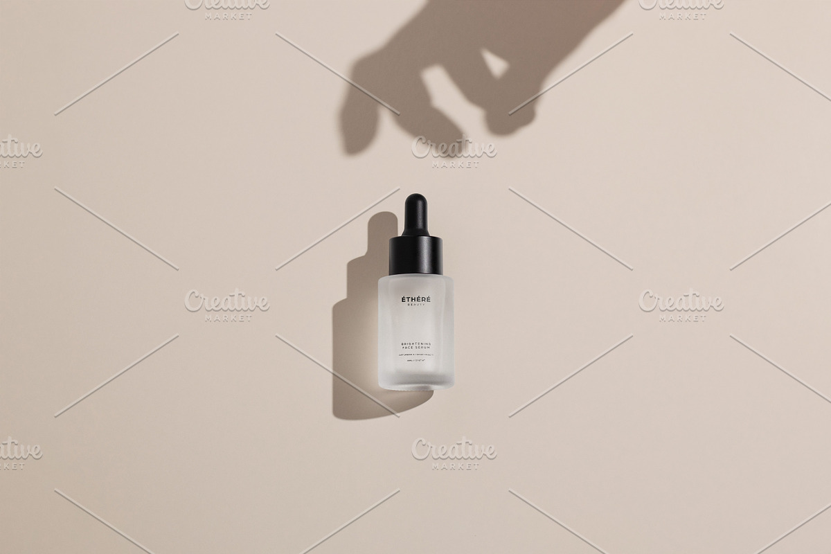 Frosted Dropper Bottle Mockup, a Packaging Mockup by Wildfield Studio (Photo 10 of 15)
