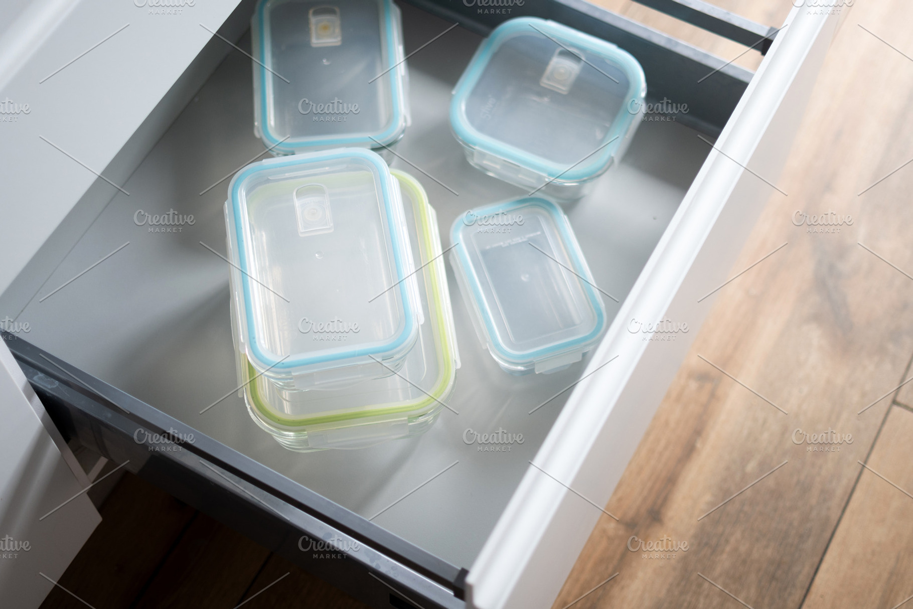 Reusable Food Storage Containers Organized in Kitchen Drawer, a Food & Drink Photo by etorres69