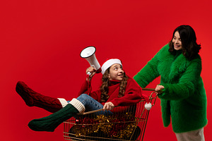 Surprised girl with megaphone, a Holiday Photo by Elena Vagengeim