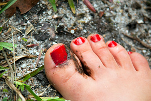 Painted Nails in Mud, a Person Photo by THP Creative