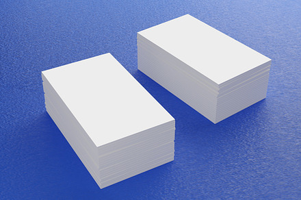 White business card mockup stacking on blue floor. Office supply, a Business Photo by Ministocker