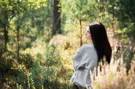 A tranquil moment of reflection in a serene forest setting durin, a Person Photo by Olena Rudo