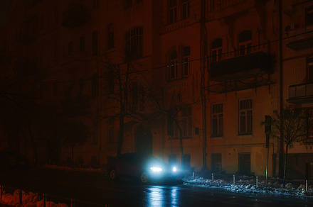 Car with headlights on in the night city., an Arts & Entertainment Photo by Rov.7