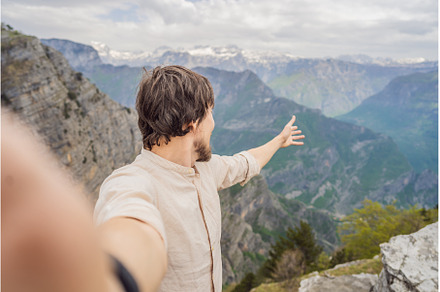 Man tourist on background of, a Nature Photo by Elizaveta Galitskaya