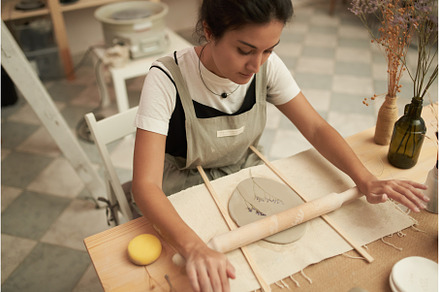 Woman making DIY pottery with plants, an Arts & Entertainment Photo by Sergey Mironov's store