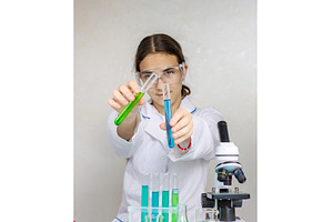 Laboratory research test tubes, a Technology Photo by yanadjana