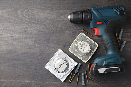 Concept of electrician tools, space for text, a Technology Photo by AtlasStudio PRO