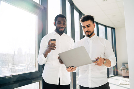 Two businessmen, a Photo by borodai94