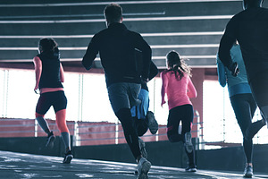 Sporty people running.