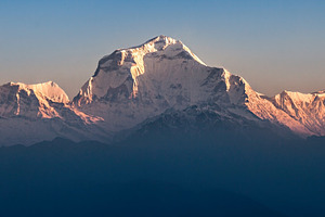 Dhaulagiri mountain on sunrise, a Photo by saiko3p