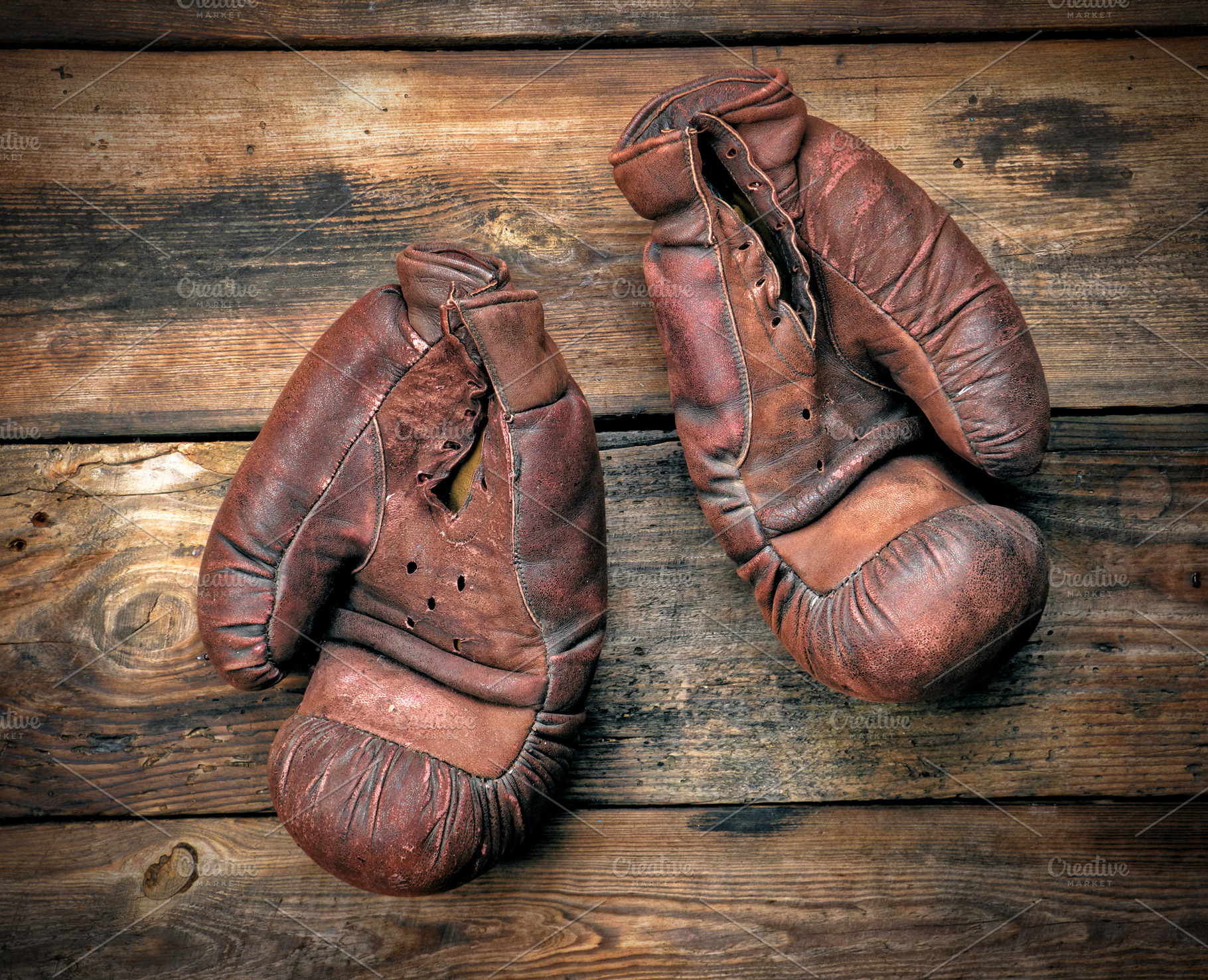 Very old leather brown boxing gloves stock photo containing sporting and age, a Sports & Recreation Photo by ndanko