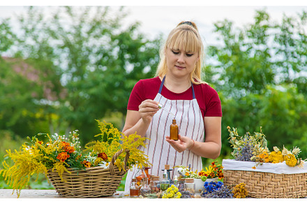 Woman with medicinal herbs and, a Nature Photo by yanadjana